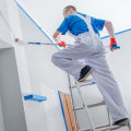 How many square feet can a painter paint per hour?