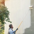 How long does it take one person to paint a house exterior?